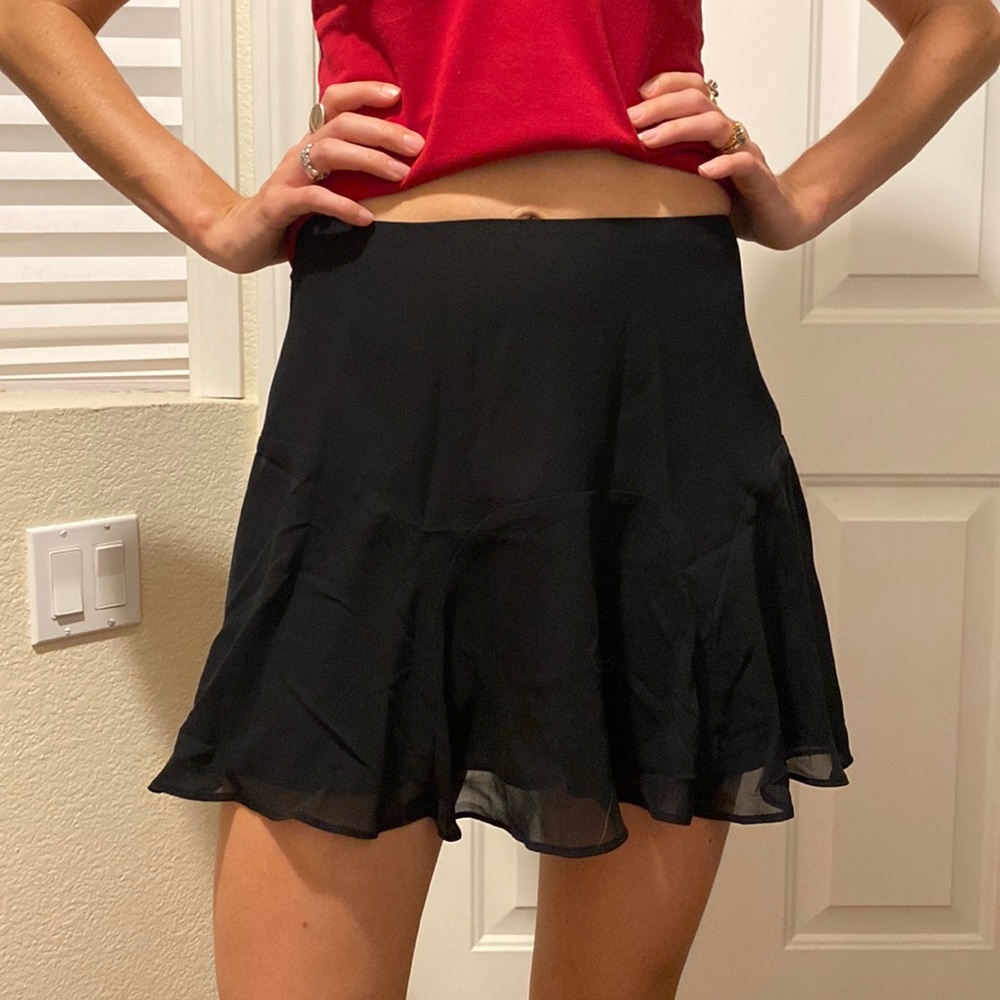 BCBG brand new mini skirt. Black. size 4 and available in size 2 as well.